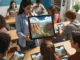 Studenti di una scuola superiore utilizzano tablet per partecipare a una spedizione virtuale del Grand Canyon con la realtà aumentata.